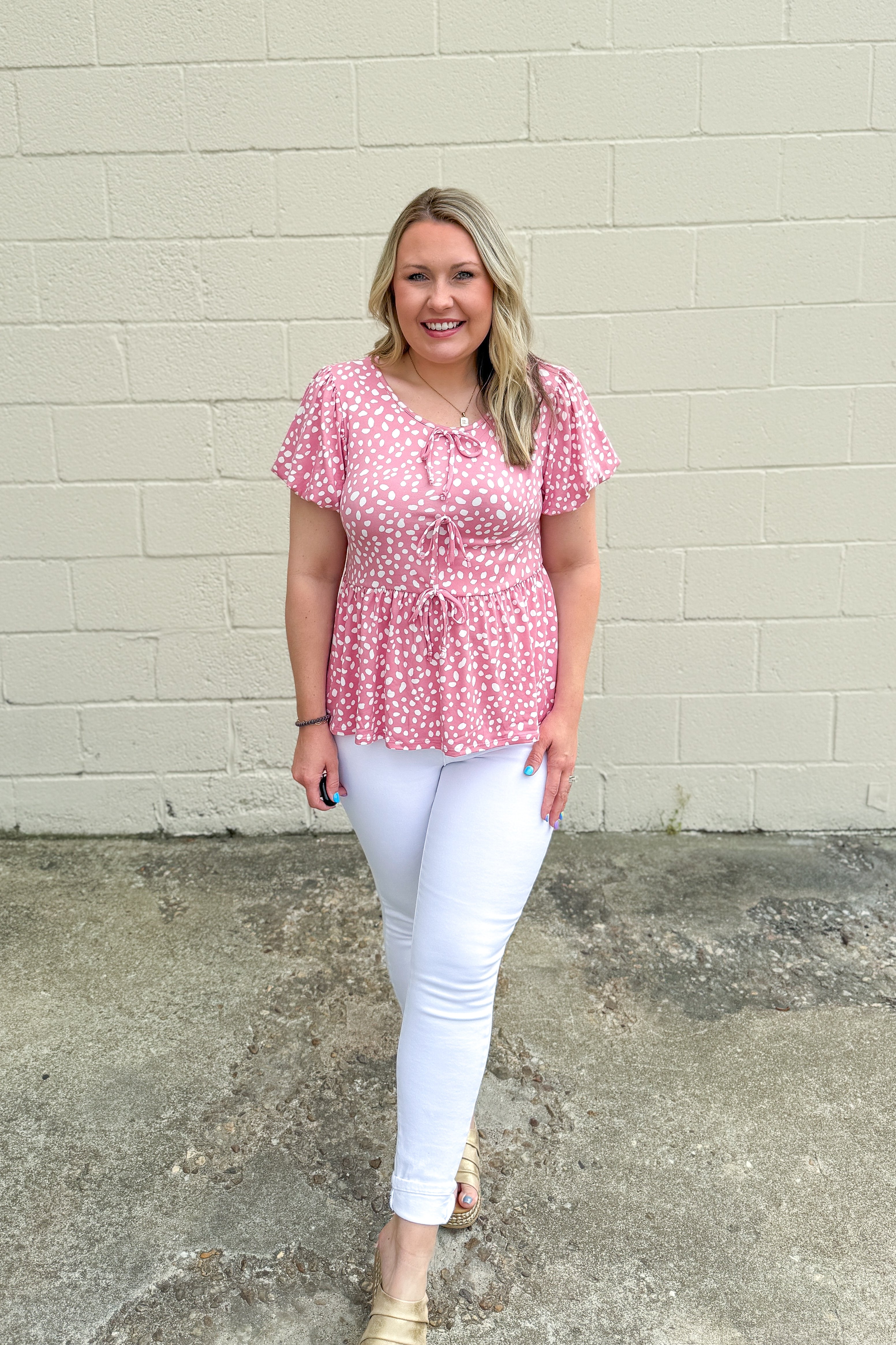 Spotted and Chic Peplum Top